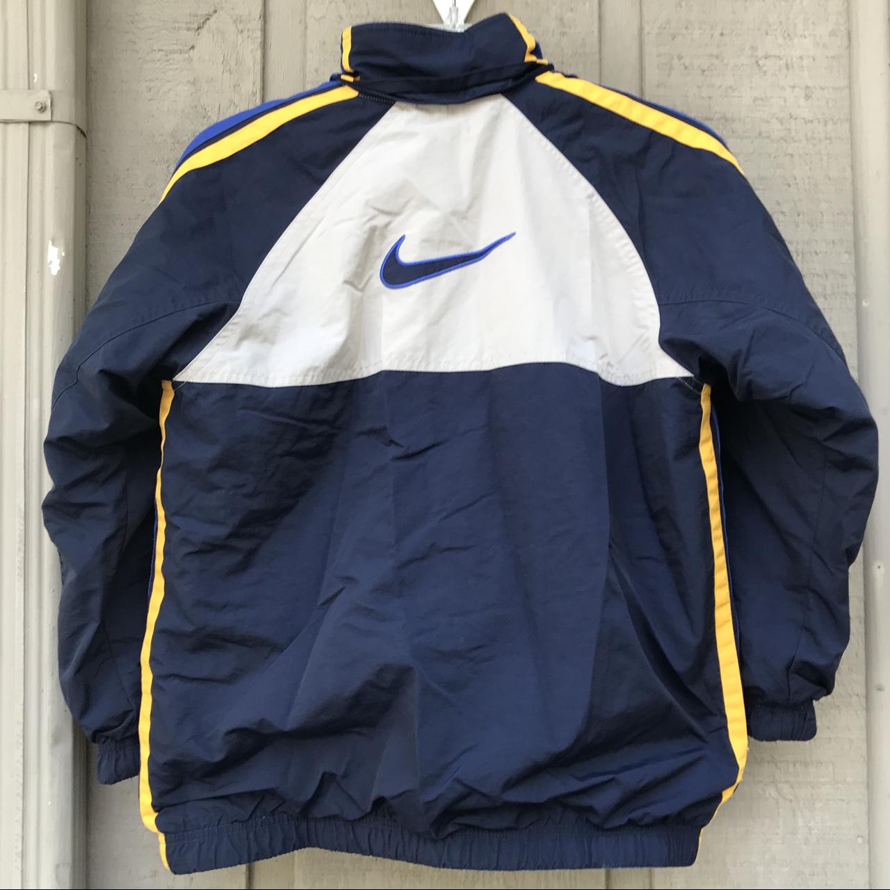 blue and yellow nike jacket