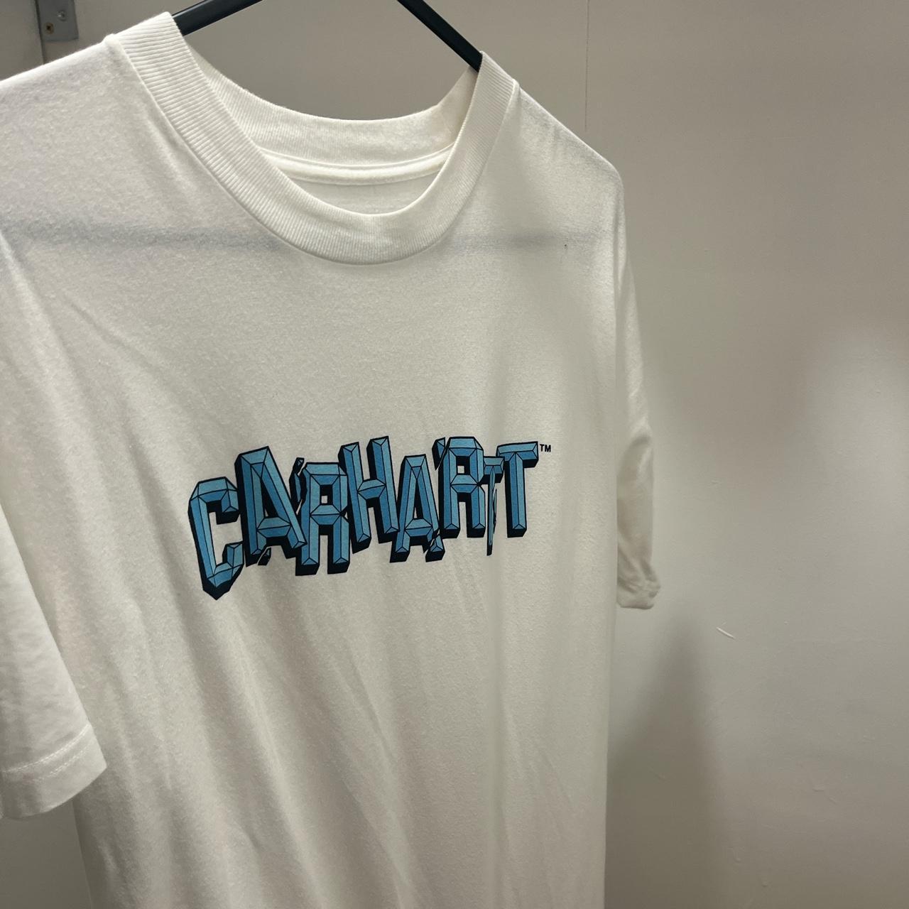 Blue graphic carhart T-shirt worn on one holiday and... - Depop