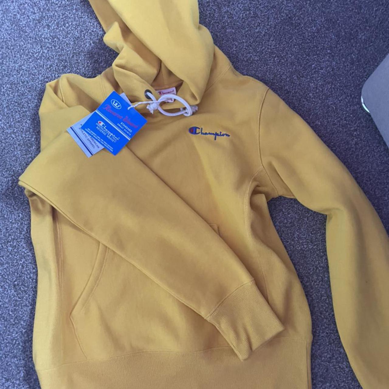 mustard champion hoodie, never worn before still new... Depop