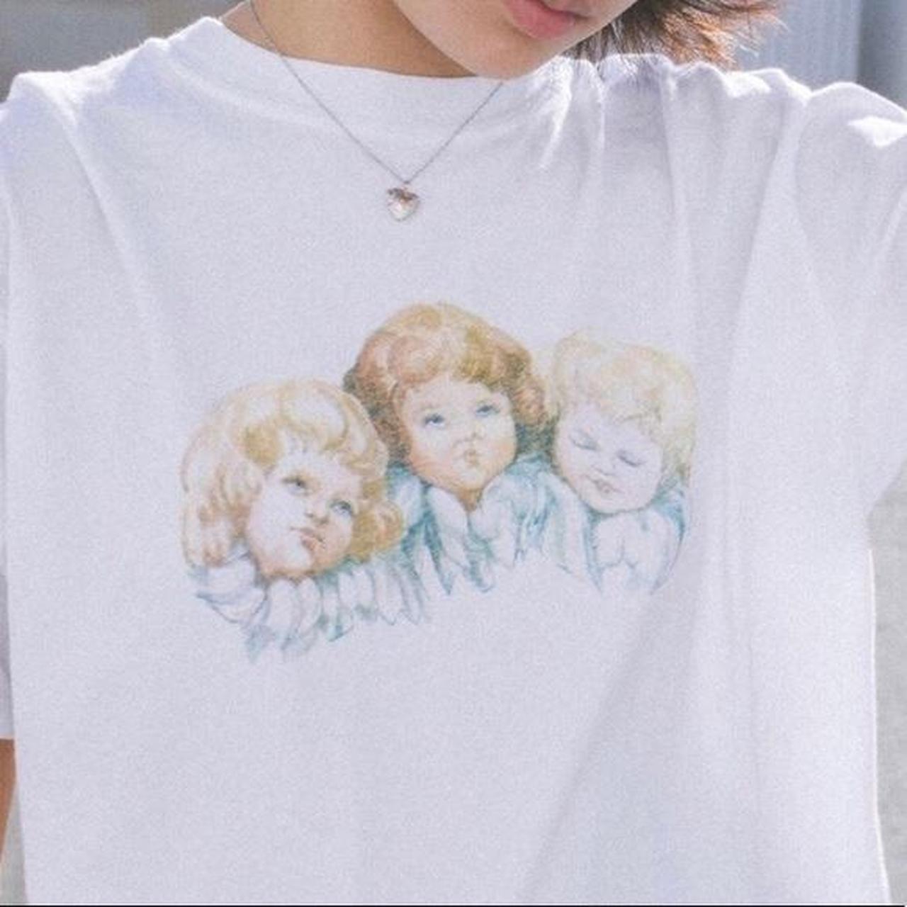 brandy melville rare angel cherub tee shirt! this is... Depop