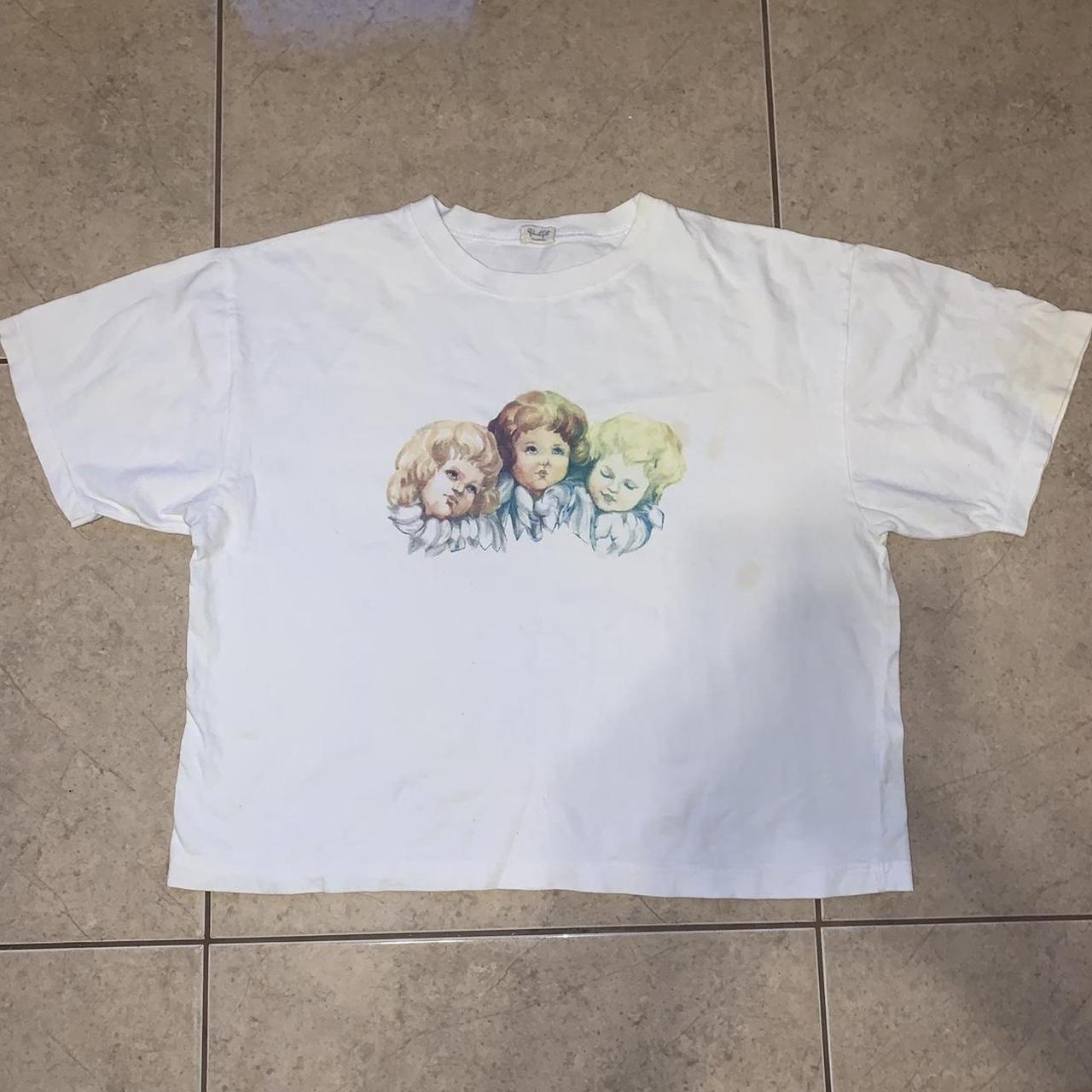 brandy melville rare angel cherub tee shirt! this is... Depop
