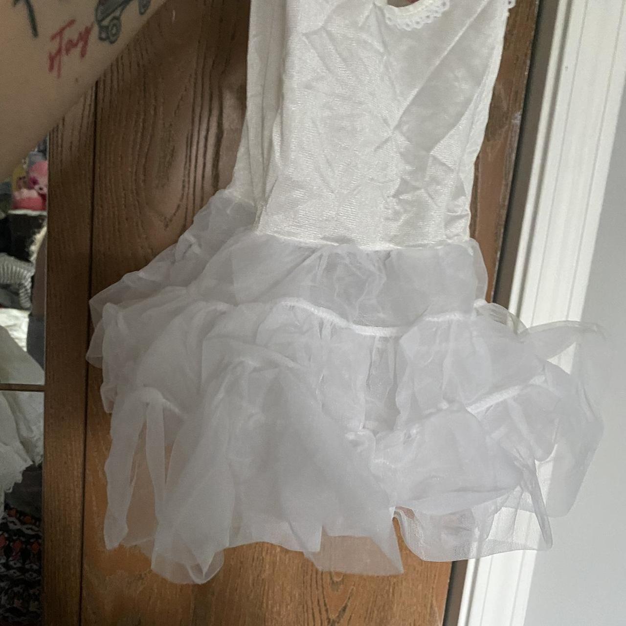 White undergarment dress slip with tulle for lift... Depop
