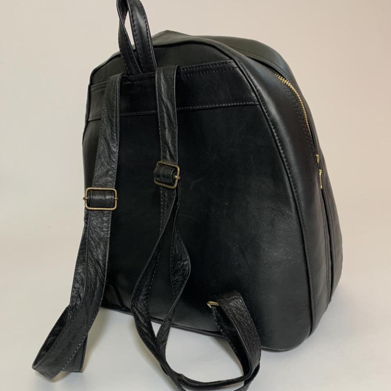 Black embossed leather backpack/bag with gold... - Depop