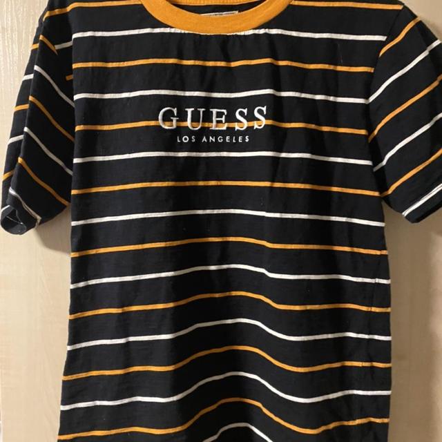 black and orange guess shirt