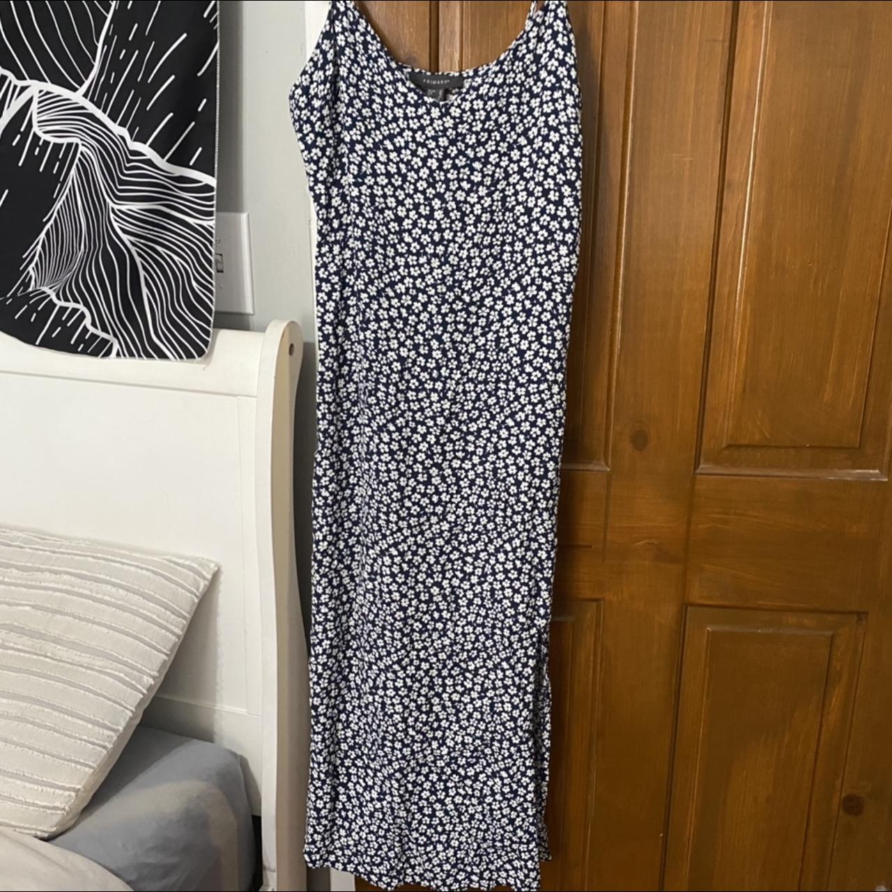 Adorable blue and daisy dress from Primark. It goes... Depop