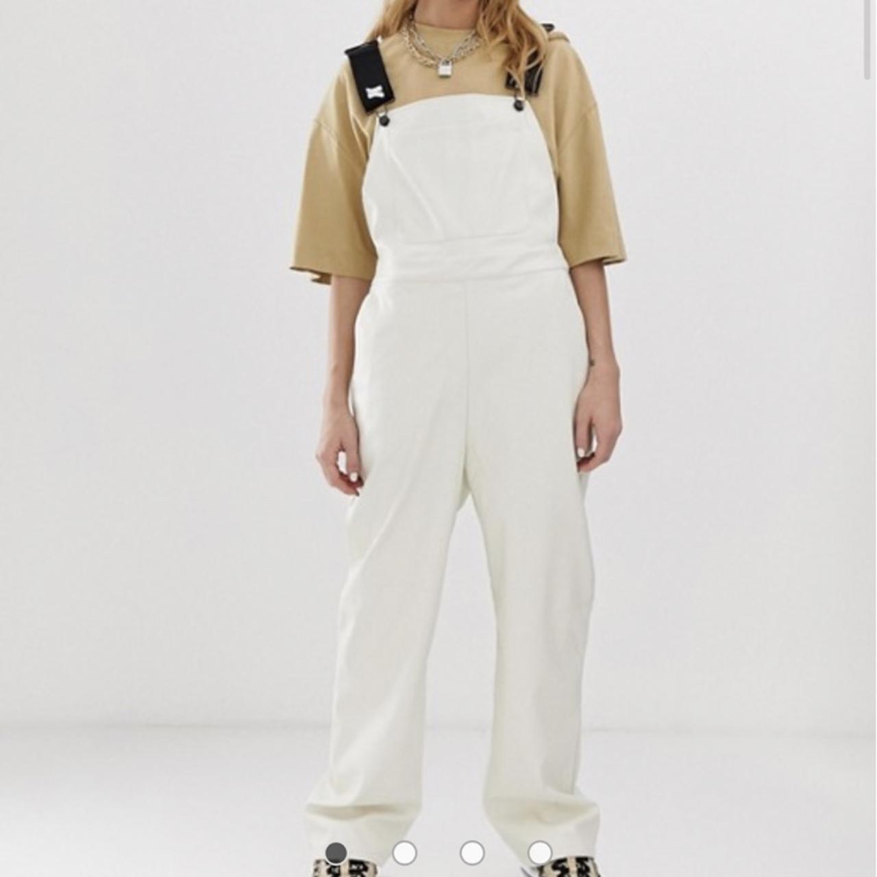 White PVC overall style jumpsuit with harness strap... Depop