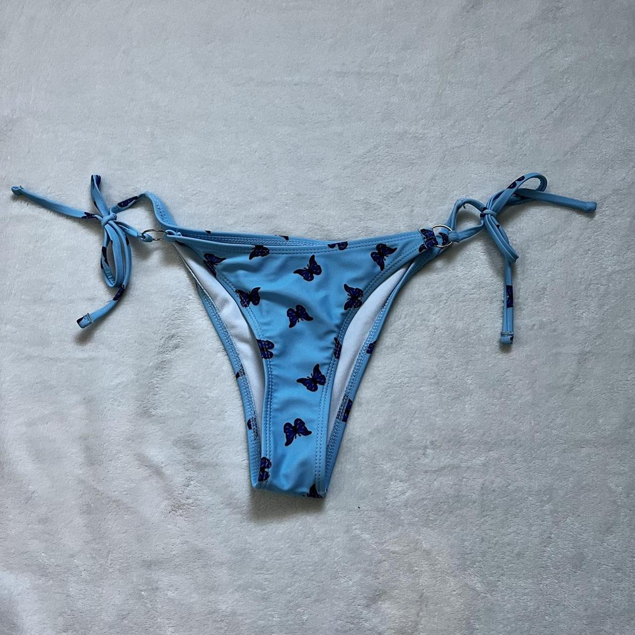 light blue bikini bottoms tie on sides with little... Depop