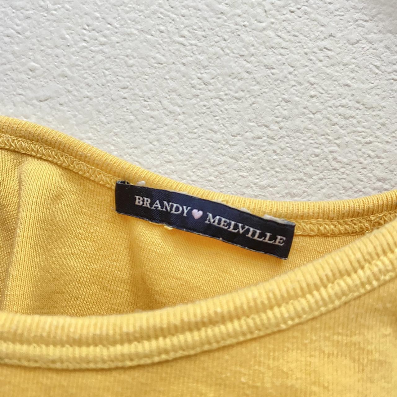 BNWT mustard yellow beyonca tank Brandy Melville, Women's Fashion, Tops,  Other Tops on Carousell