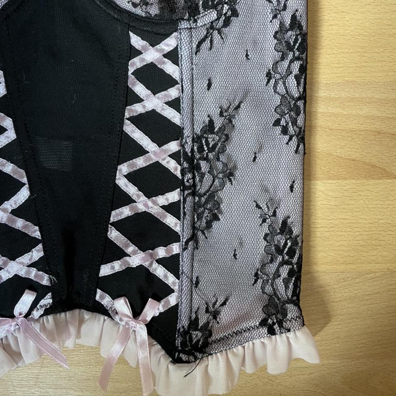 Black and pink lace bustier/corset with ruffles at... Depop