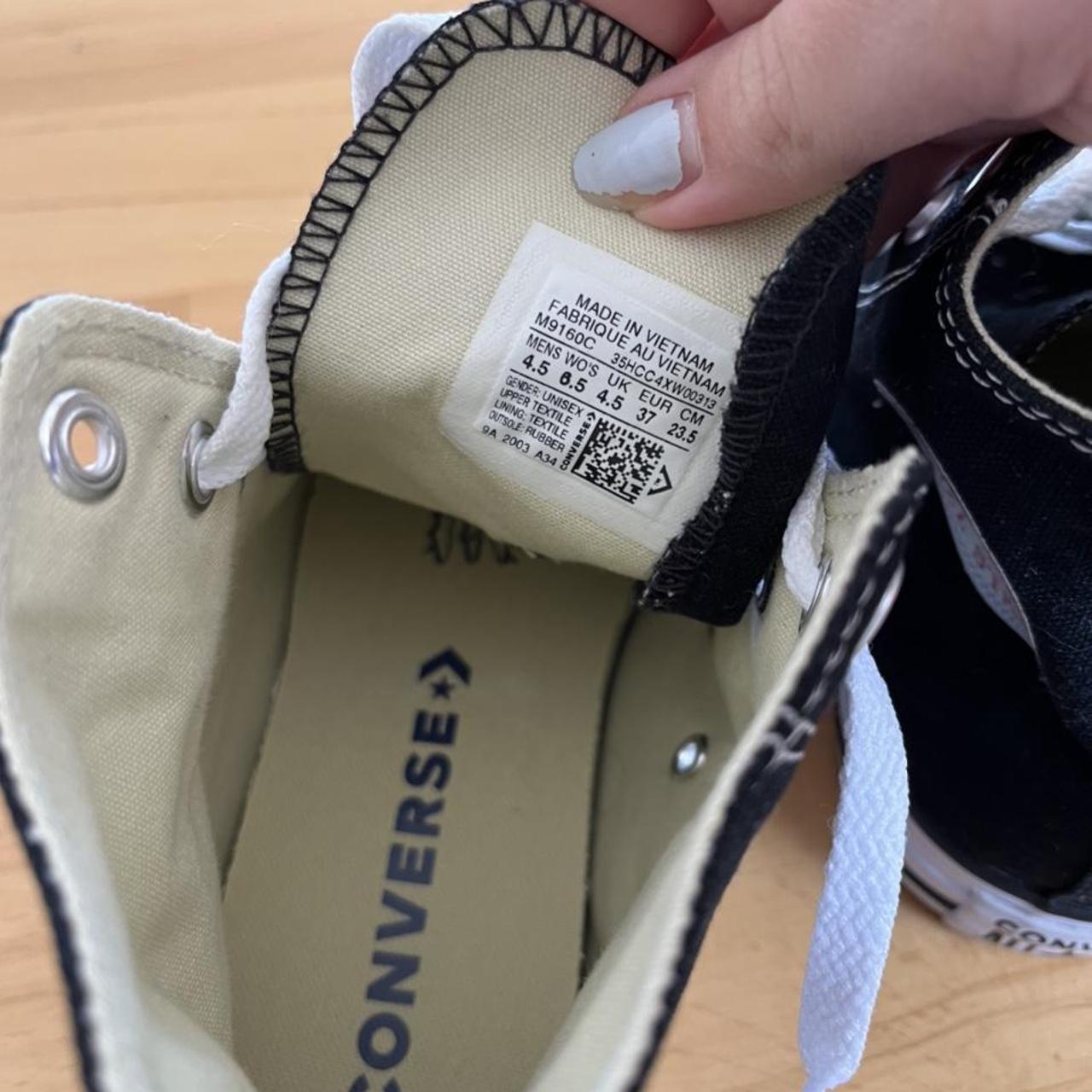 Next to perfect condition black high top converse... Depop