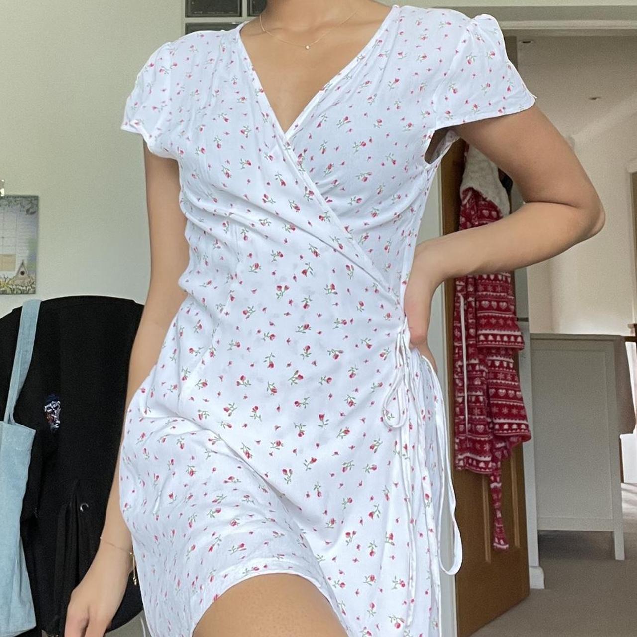 floral pattern brandy melville wrap dress, super... Depop