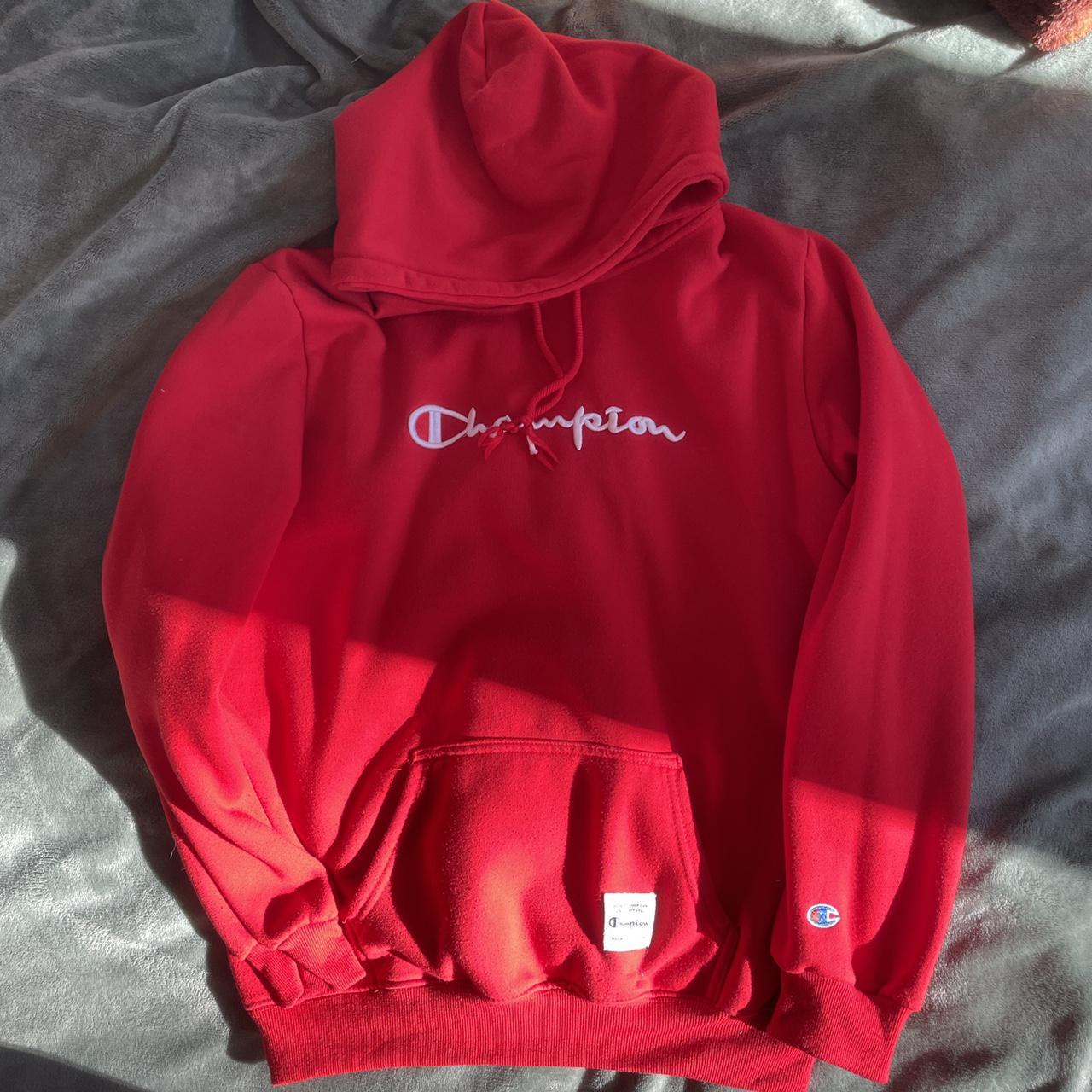 red champion hoodie worn well size tag is cut off,... - Depop