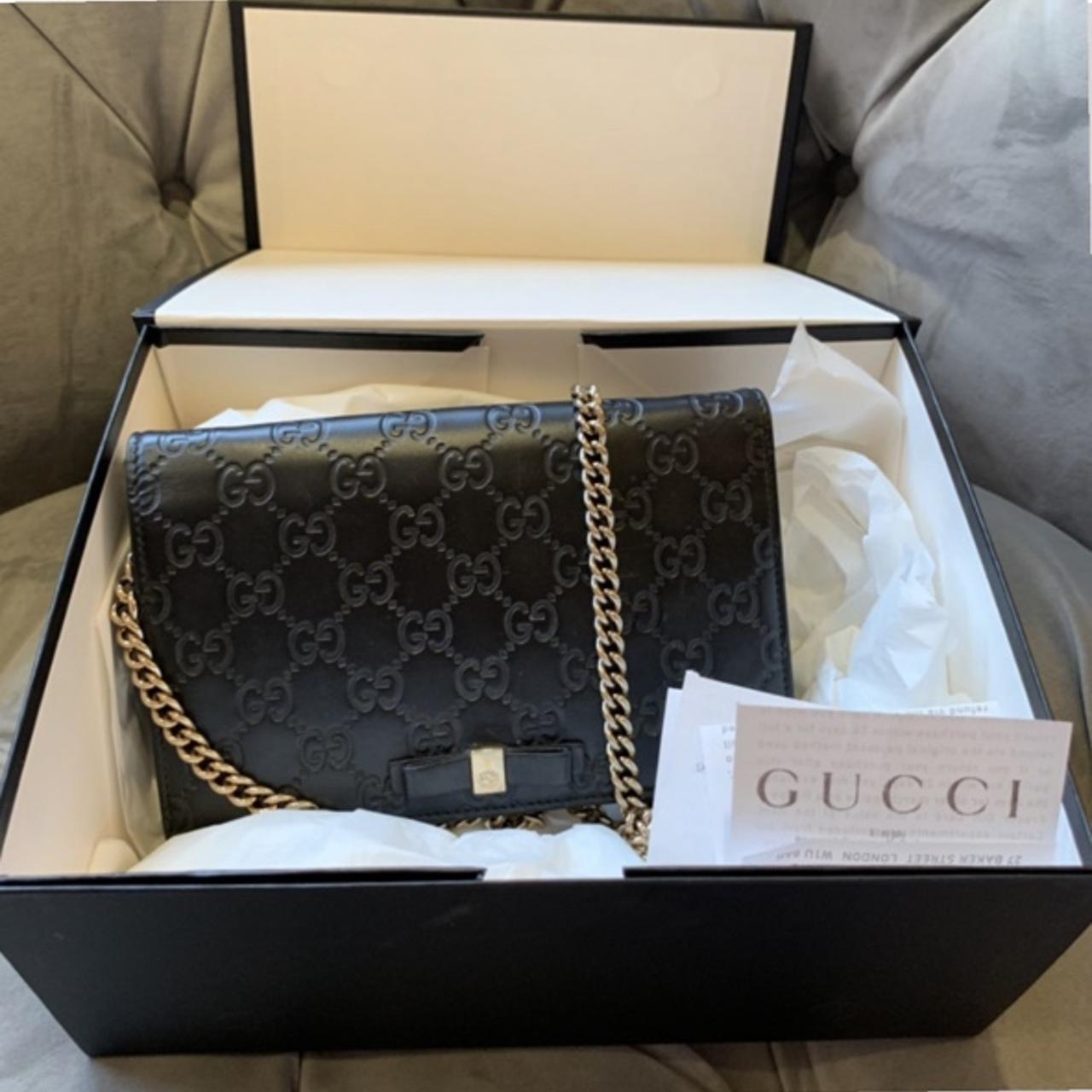 Gucci discount embossed bag