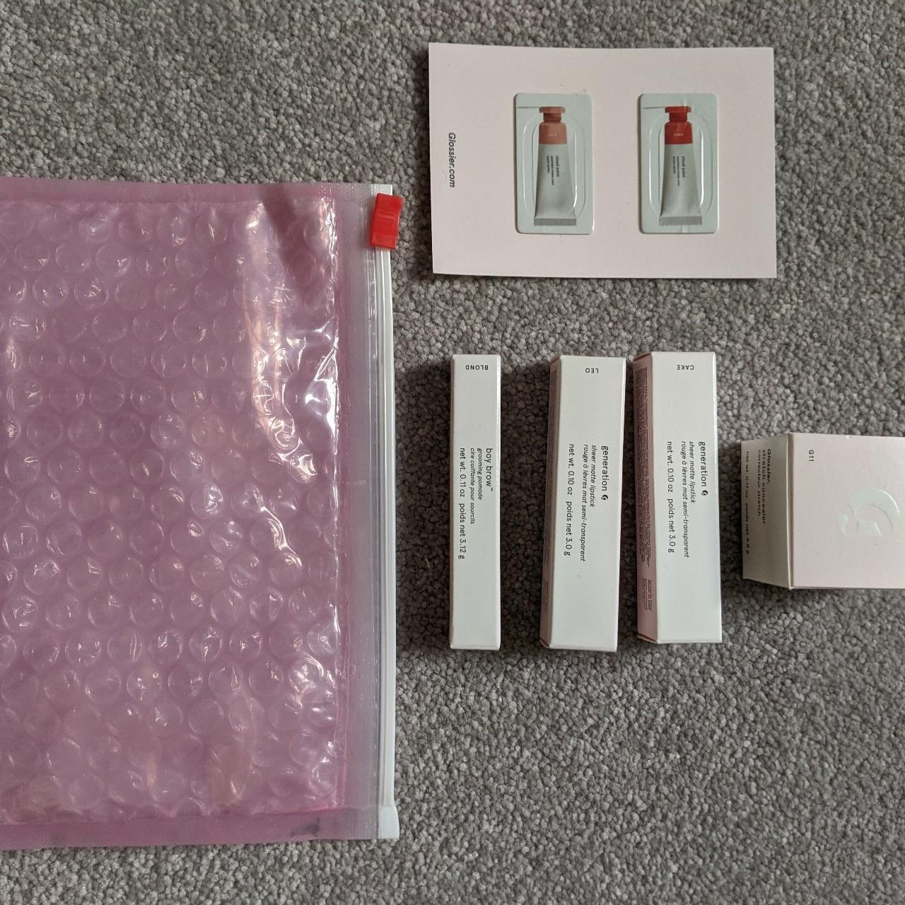 Glossier empty boxes, bubble wrap carry case and... Depop