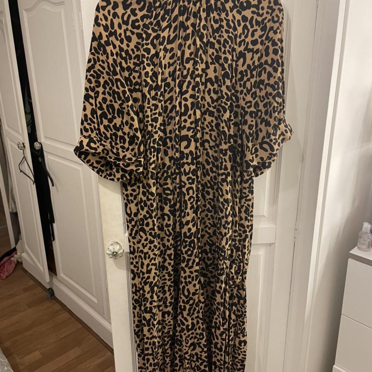 Leopard print midi dress. Slit up front. Buttons at - Depop