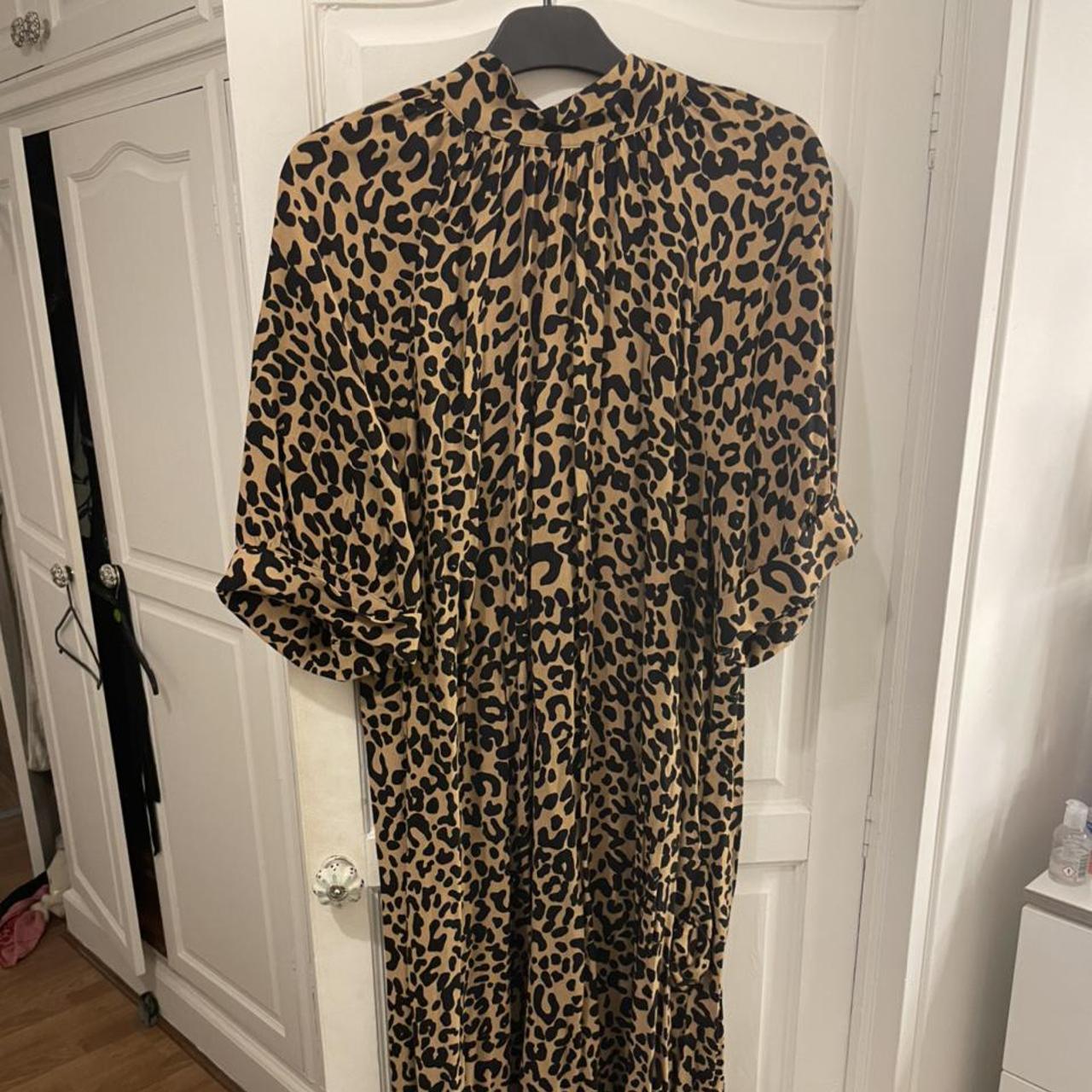 Leopard print midi dress. Slit up front. Buttons at... - Depop