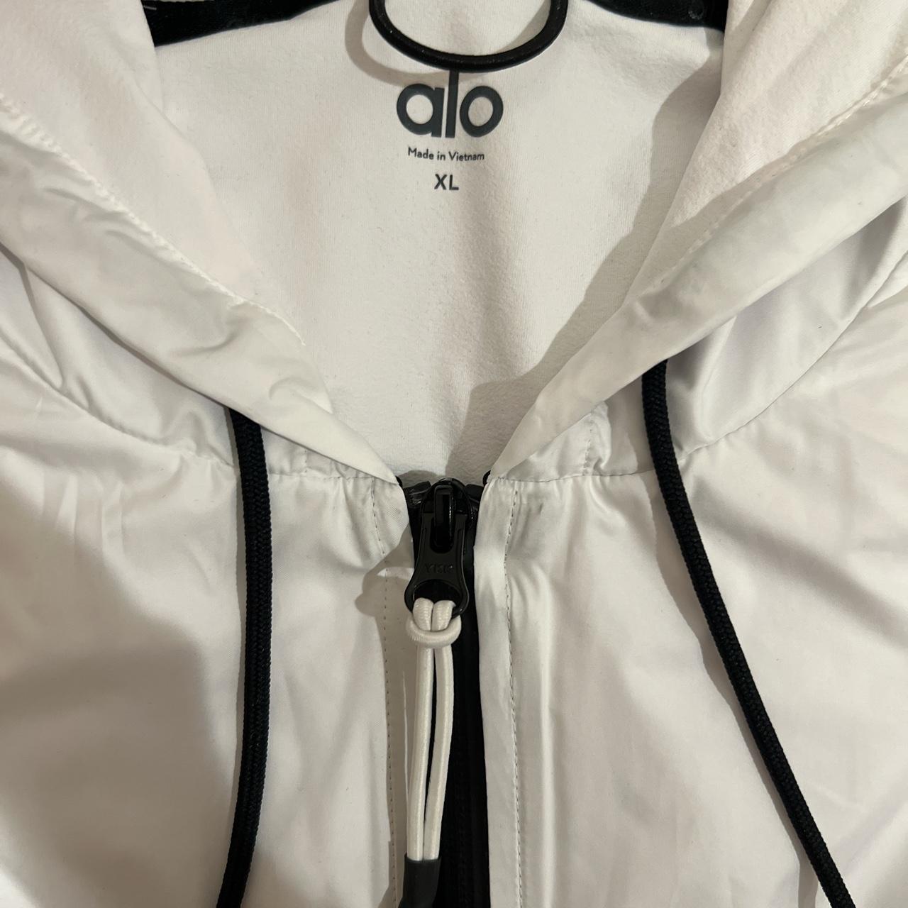 Alo Yoga White rain jacket. Size XL. Brand new,... - Depop