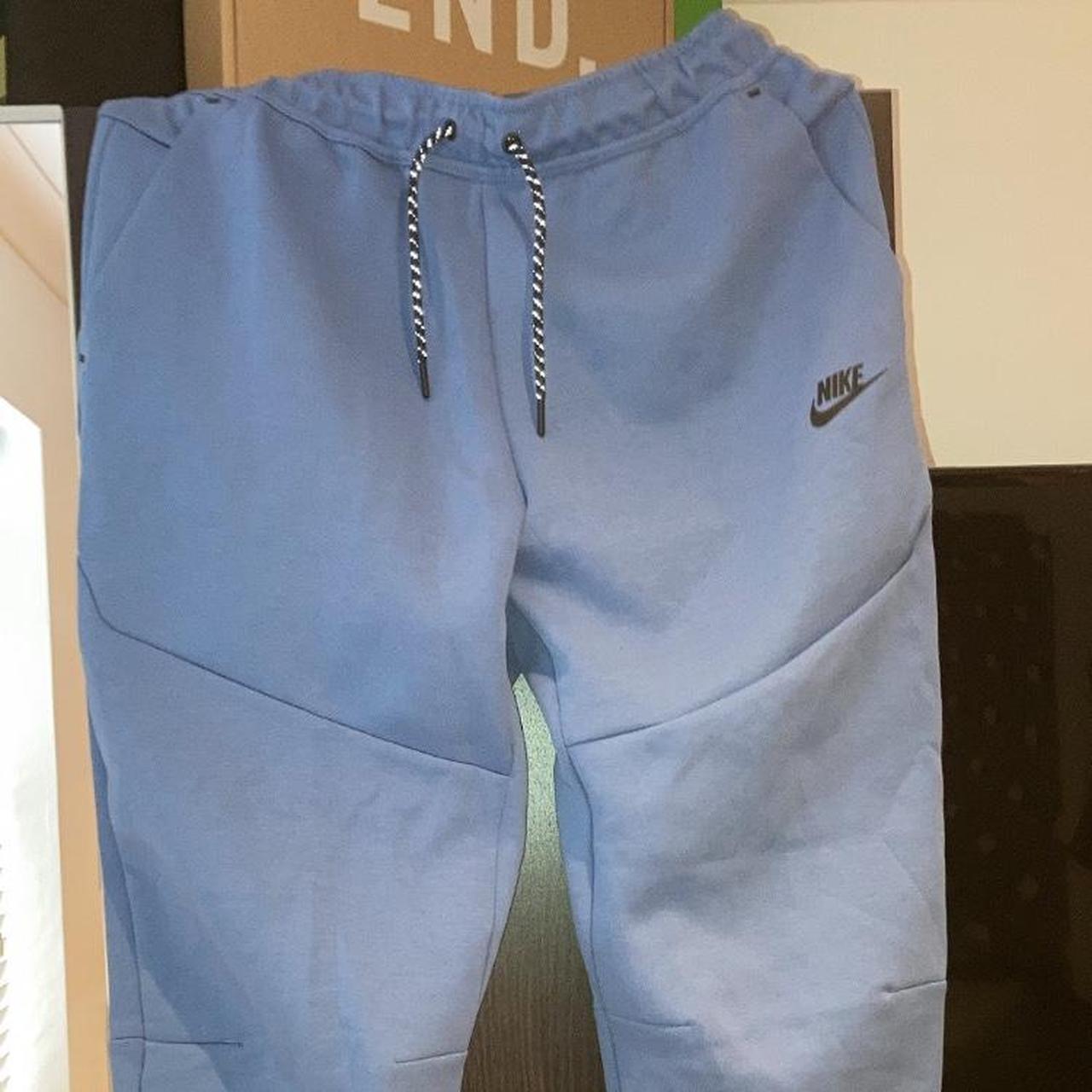 nike tech fleece stone blue joggers