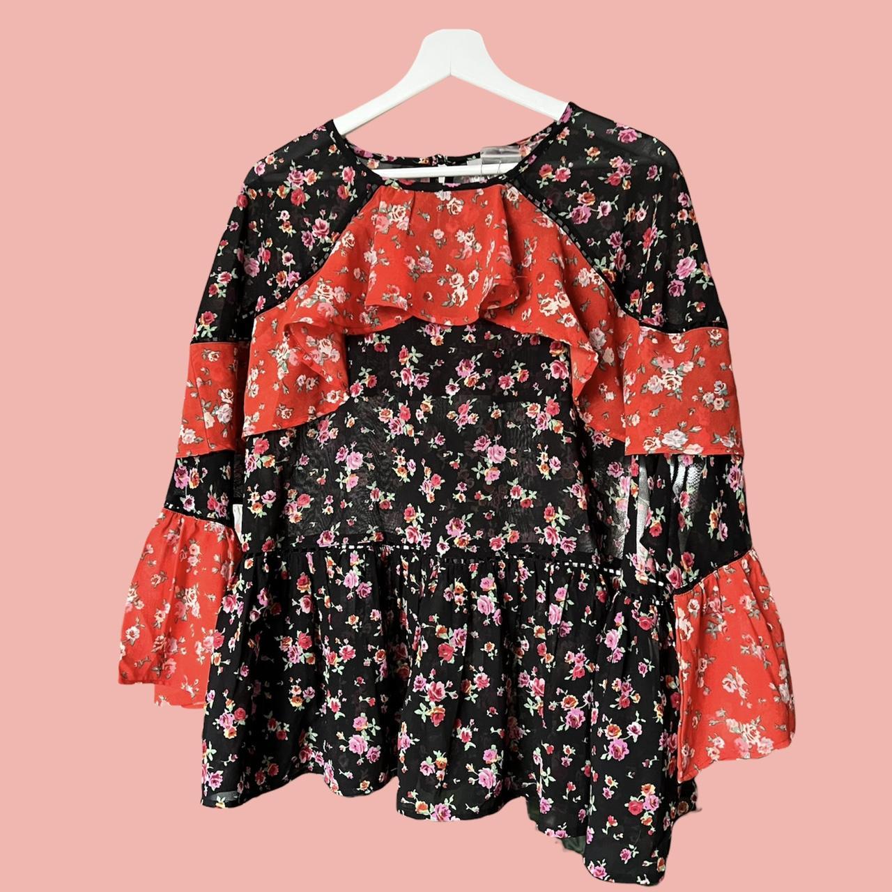 Floral babydoll / peplum style blouse with frilly... Depop