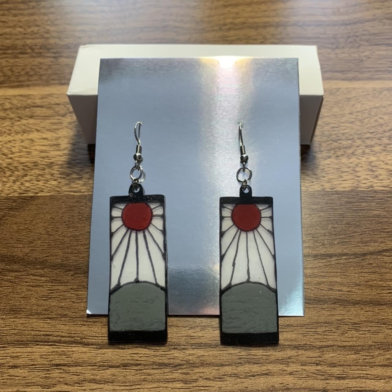 Tanjiros Hanafuda Earrings Meaning  Importance