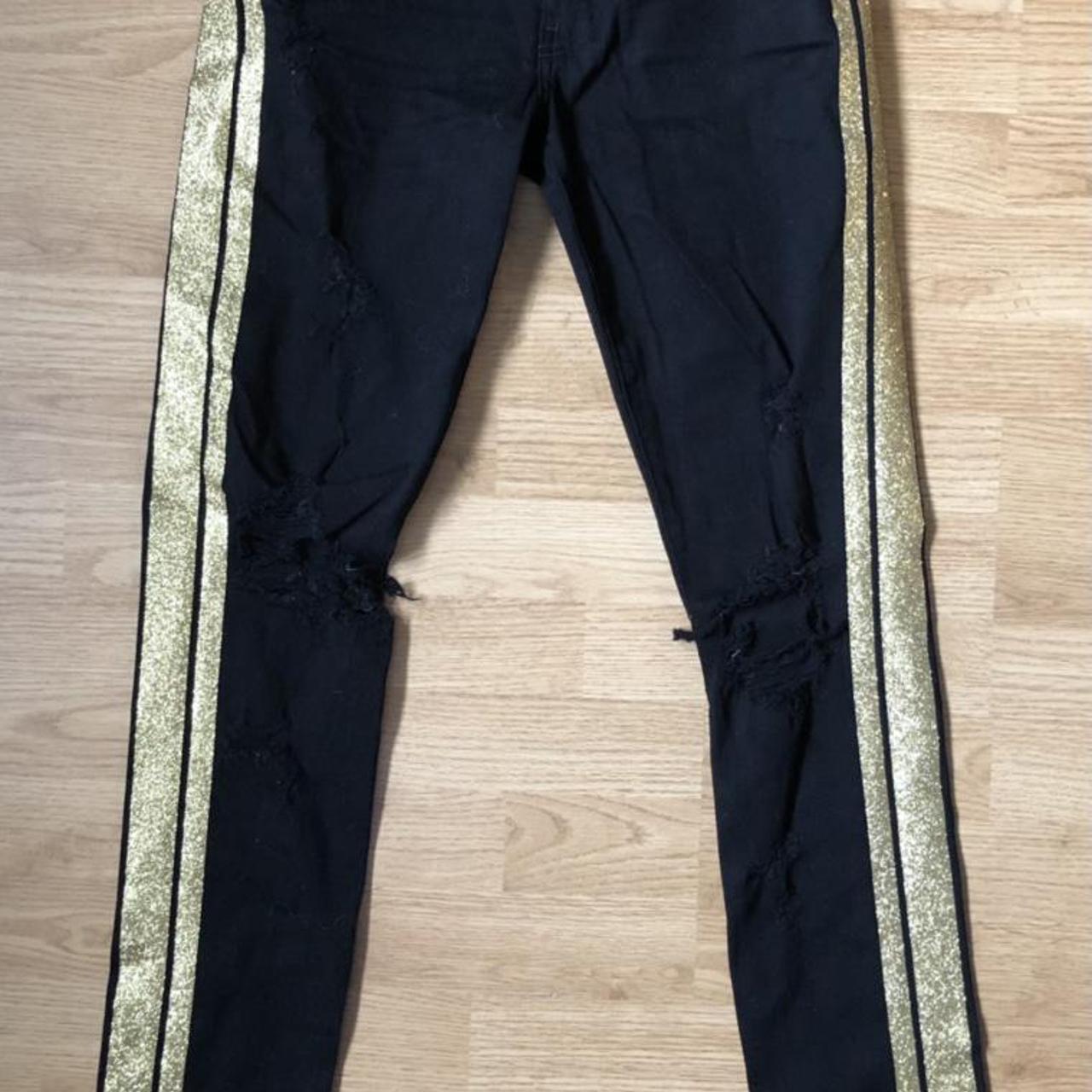 amiri jeans with stripes