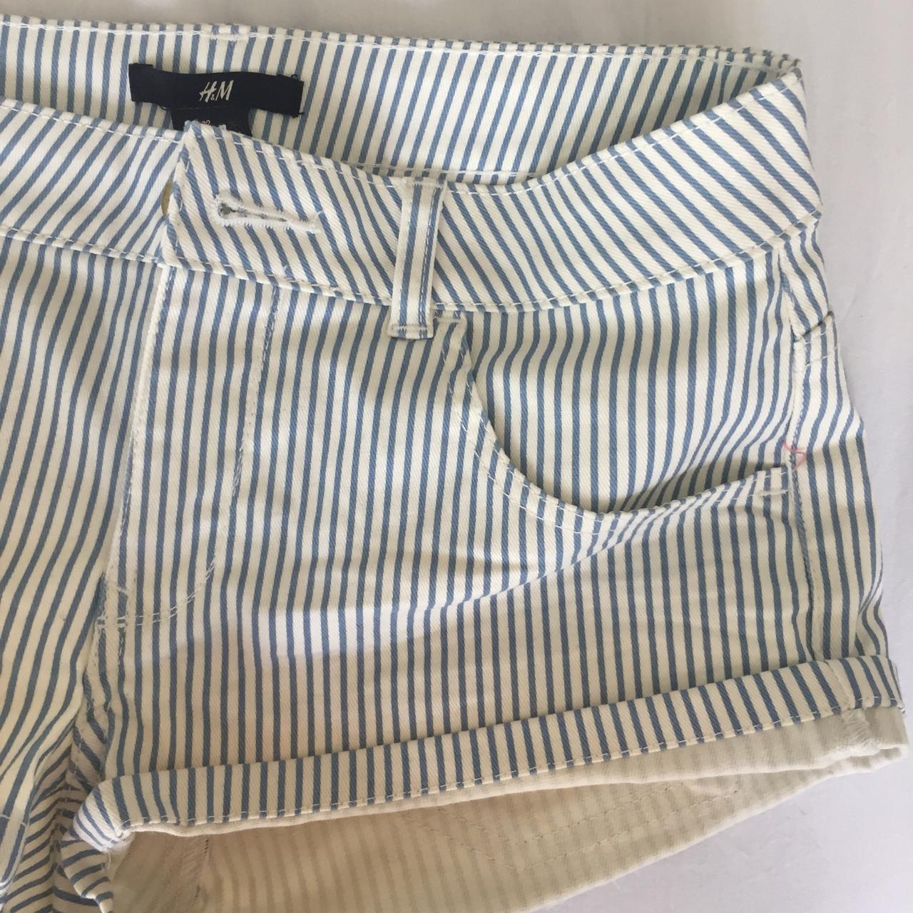 H&M blue and white vertical striped denim hot pant... - Depop