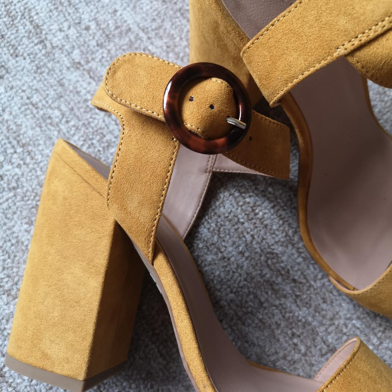 Mustard yellow strappy block heels from New Look.... Depop