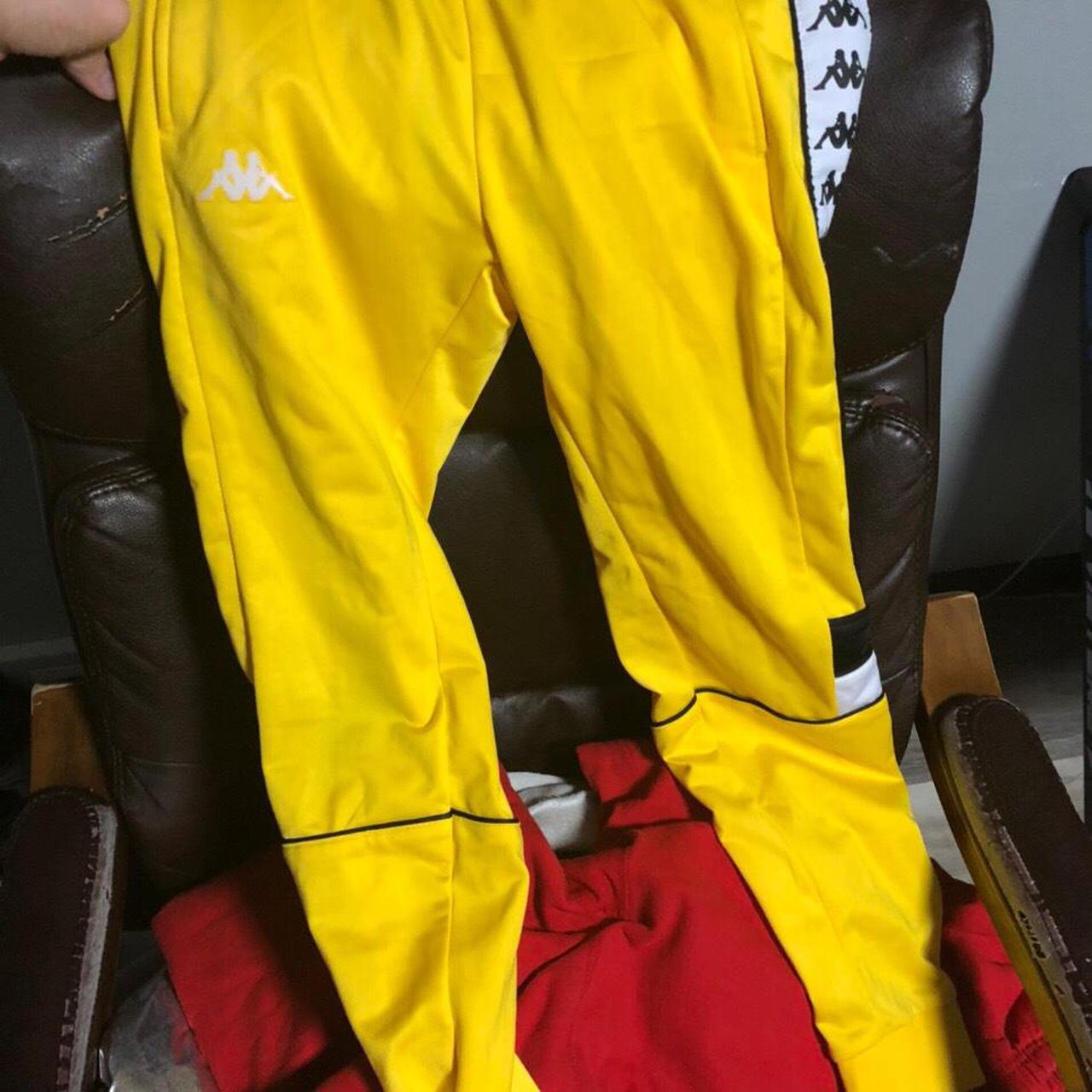 yellow kappa track pants