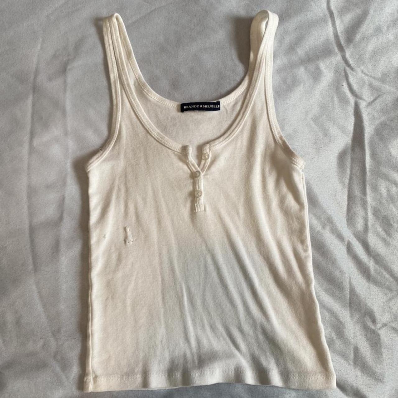 White tank top from brandy melville has some holes... - Depop