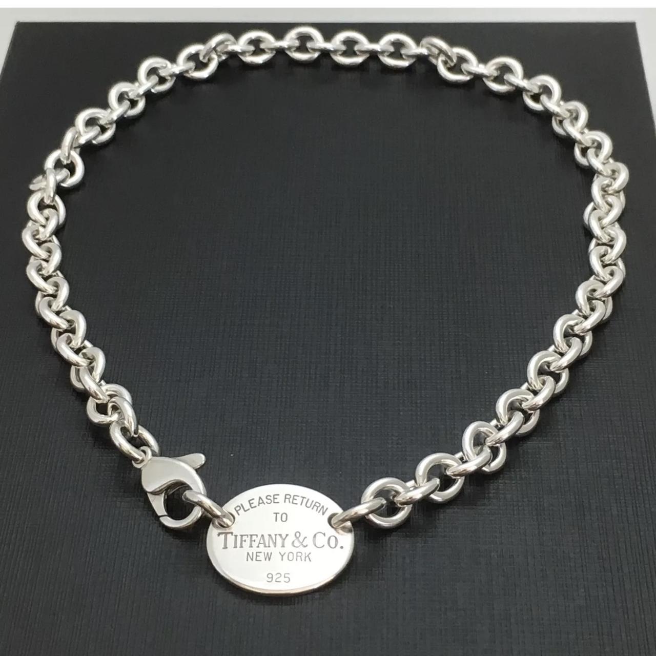 TIFFANY AND CO return to Tiffany silver oval tag... - Depop