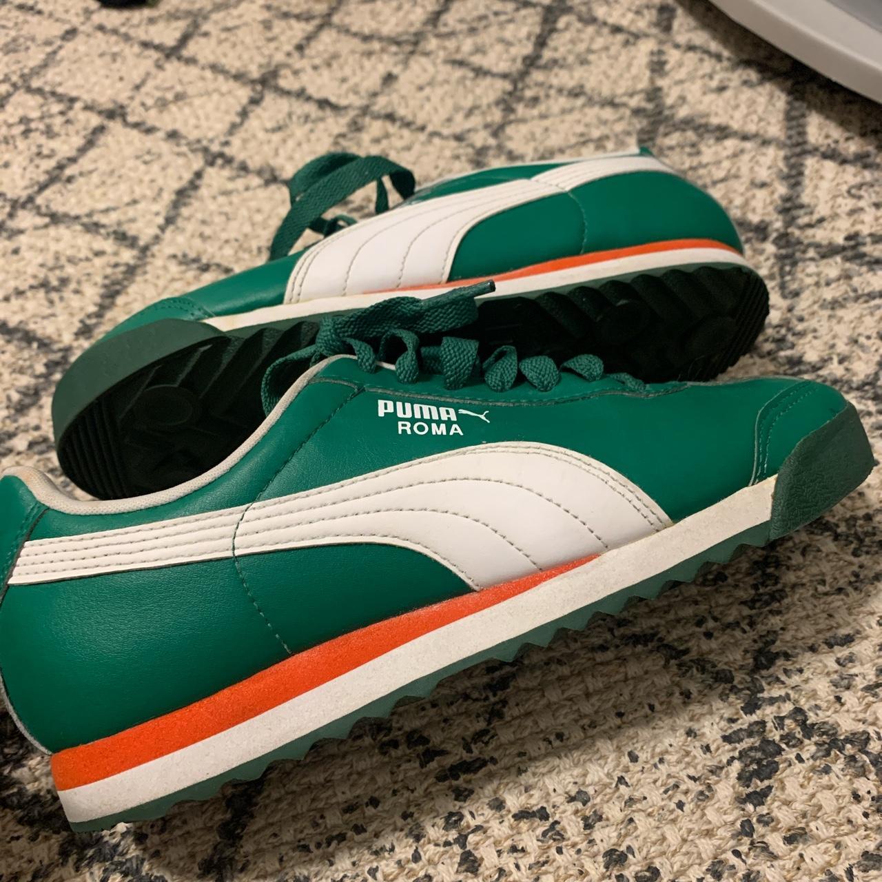 Green Puma Roma with white and orange accents Great. Depop