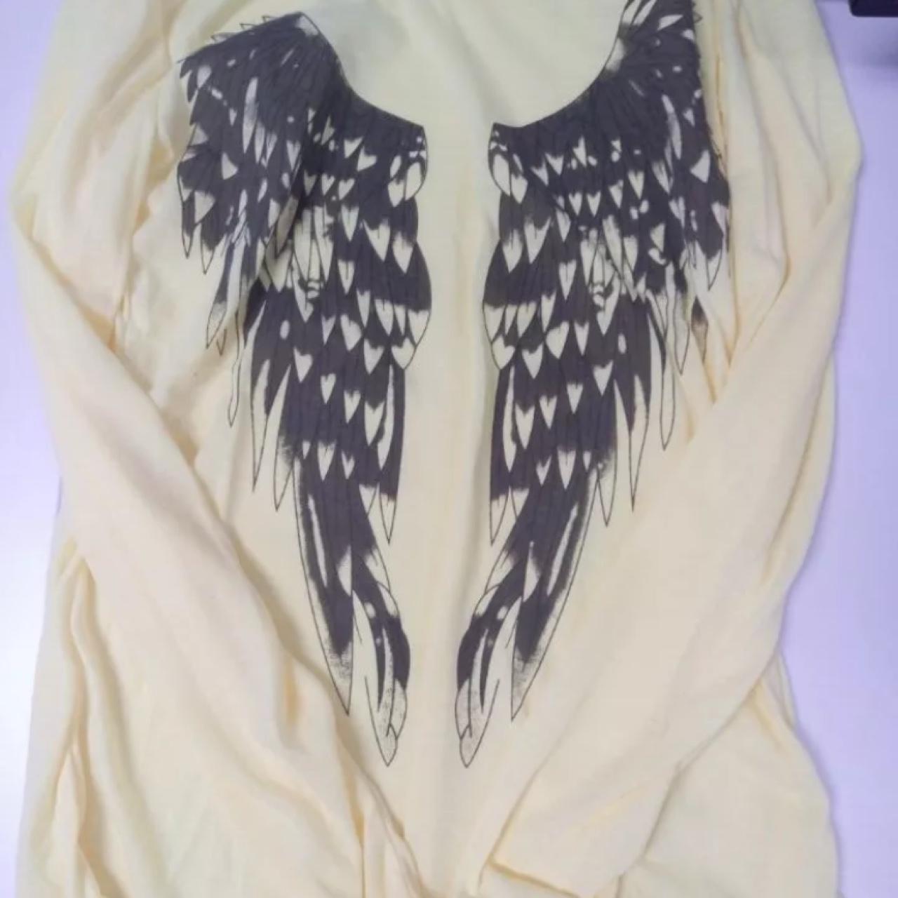 Long sleeve cream top with slightly low back / front... - Depop