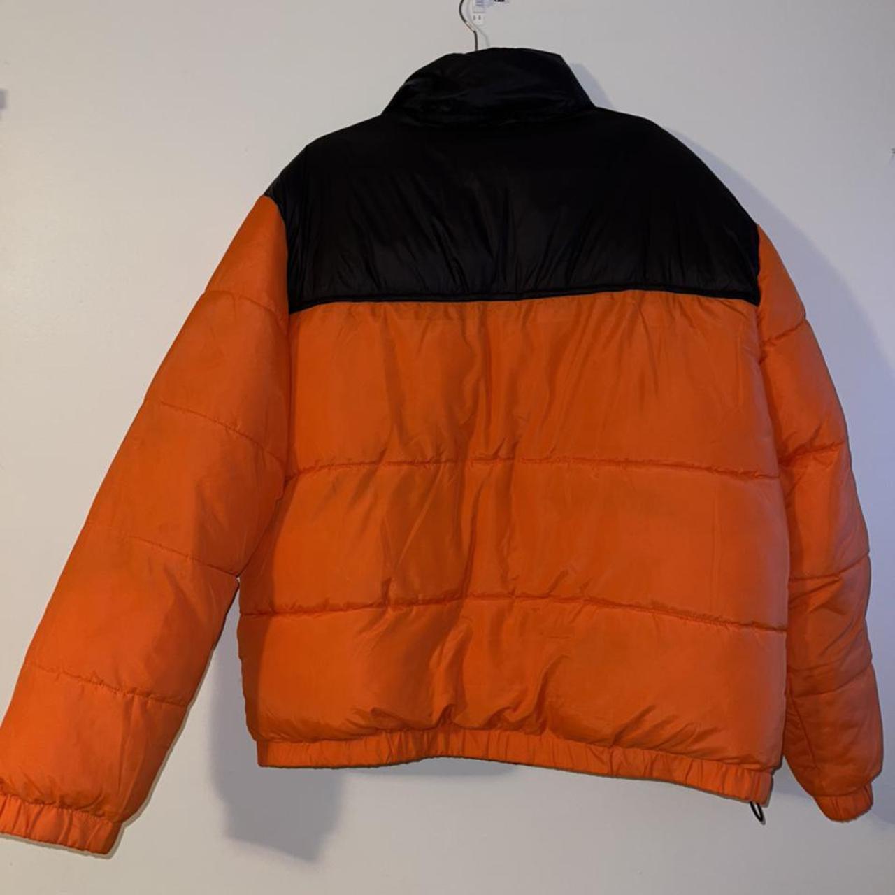 Used H&M Divided puffer coat in orange and black.... - Depop