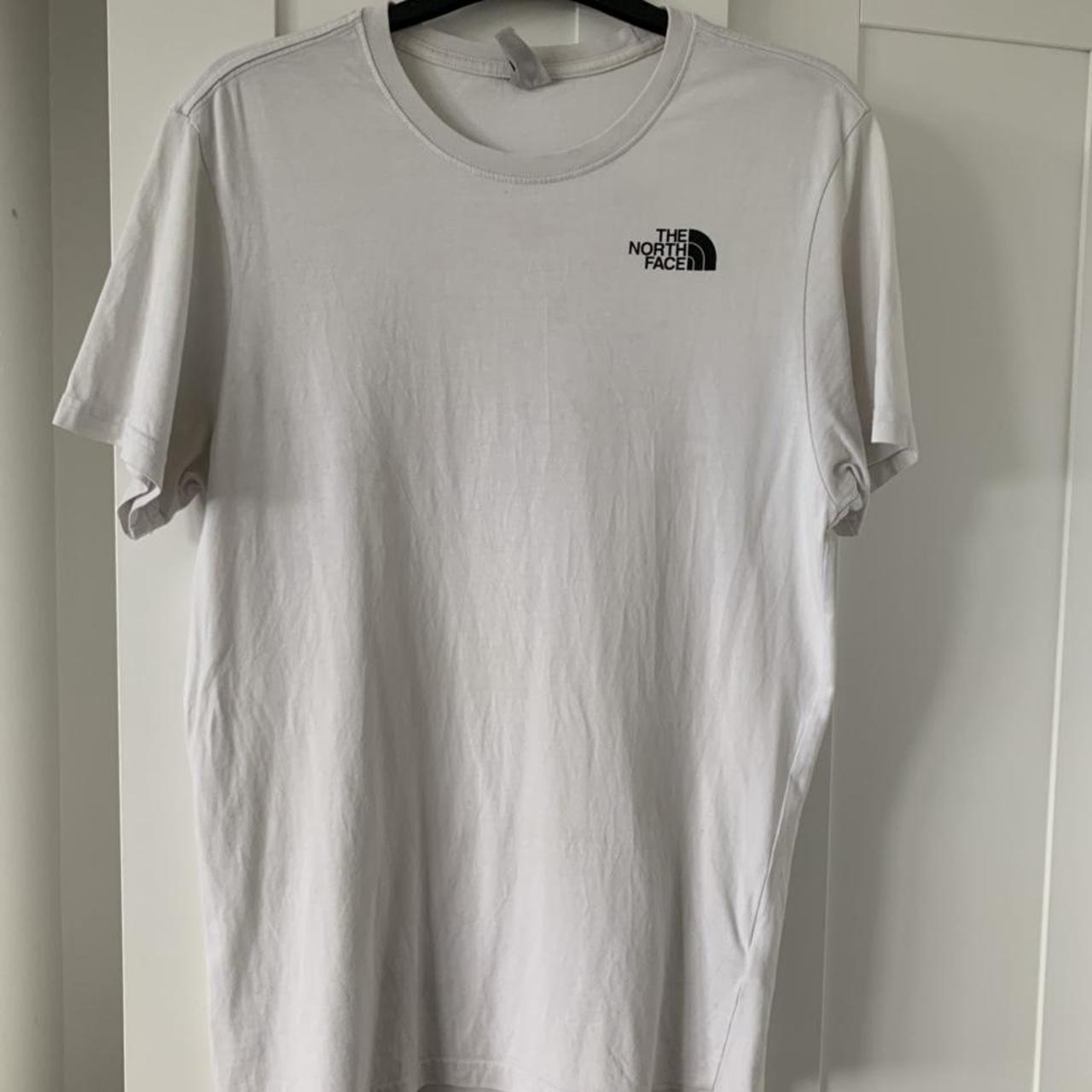 men’s north face white T-shirt with red box slight... - Depop