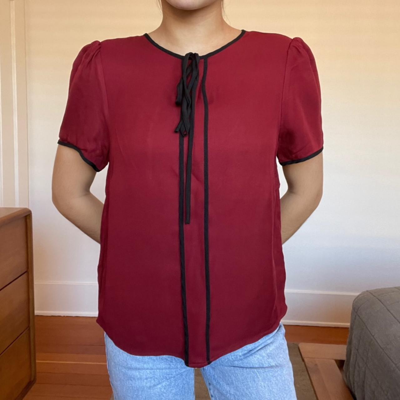Burgundy blouse with black outlining Has the cutest... - Depop