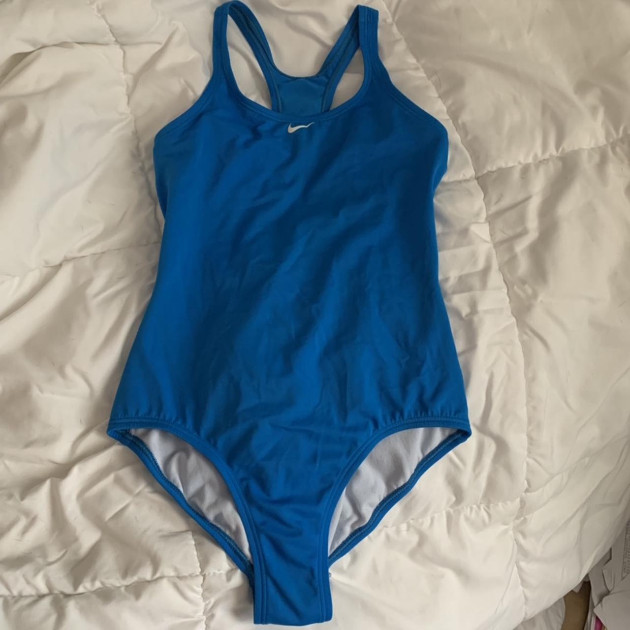 Blue nike one piece swim suit!!! I used to wear this... - Depop