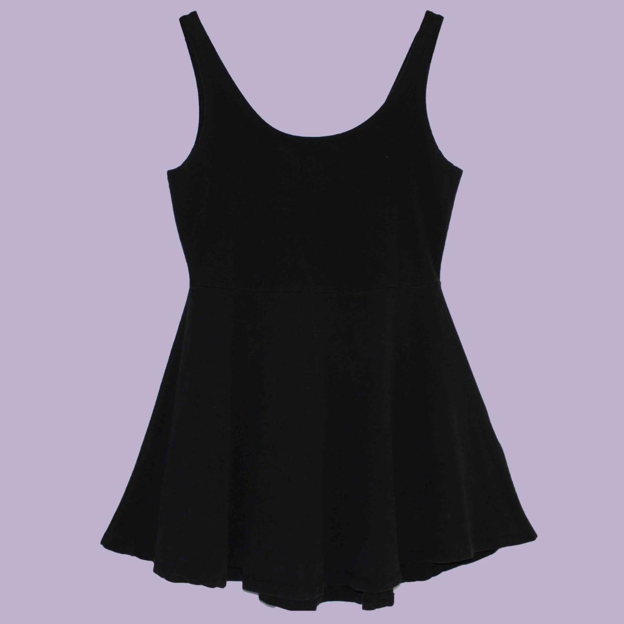 Simple little black baby doll dress. Sleeveless with... Depop
