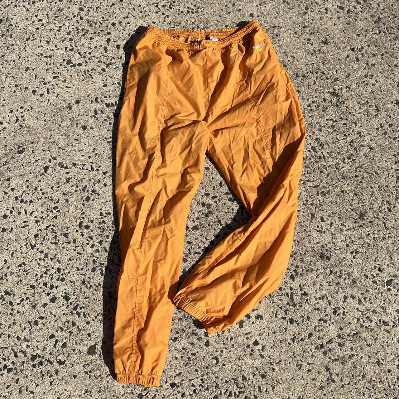 Reebok trousers mens clearance orange