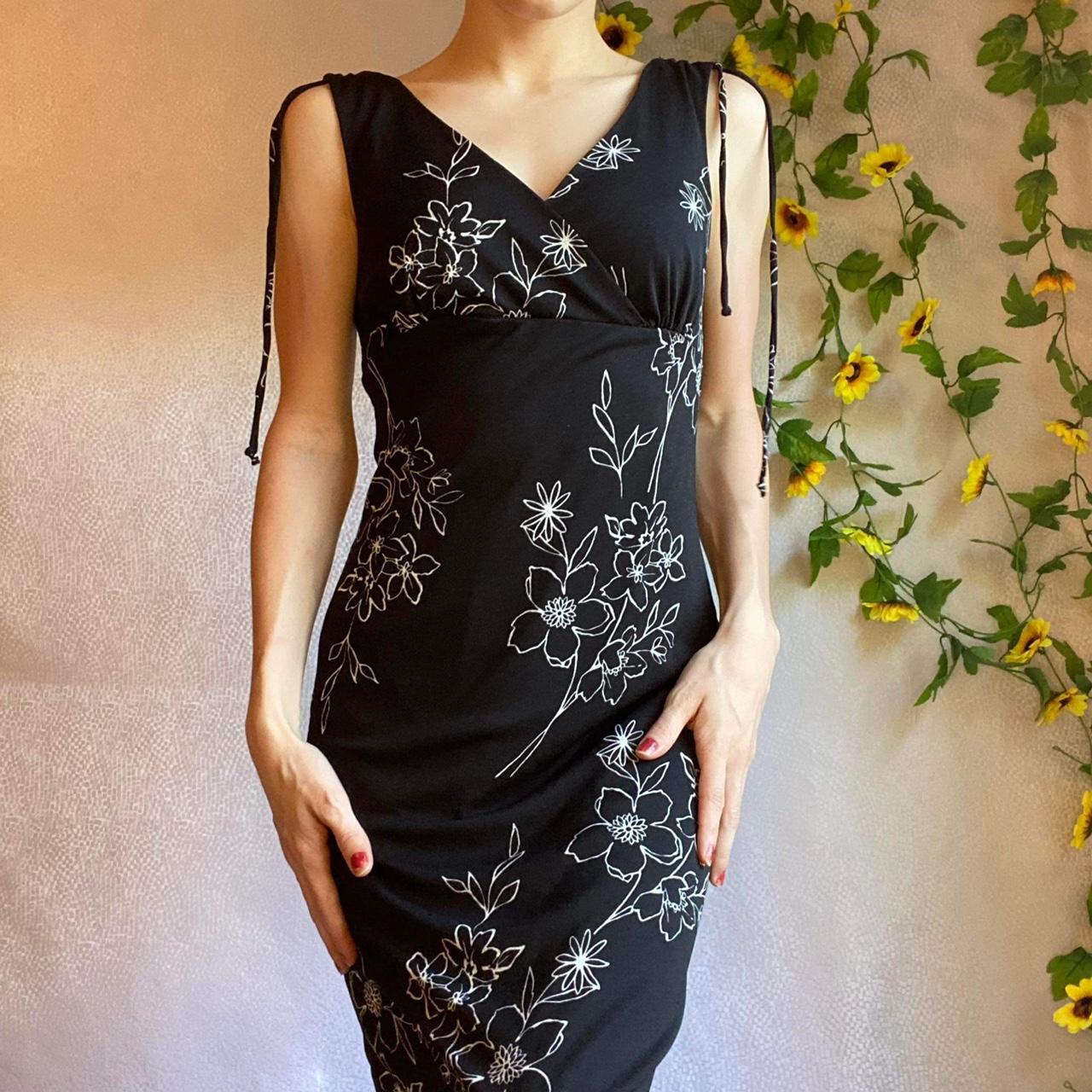 black dress with small white flowers