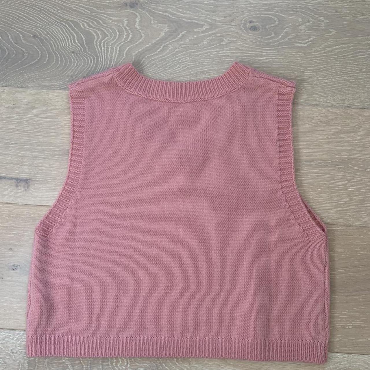 Pink sleeveless sweater vest / knit vest. Shown on... Depop