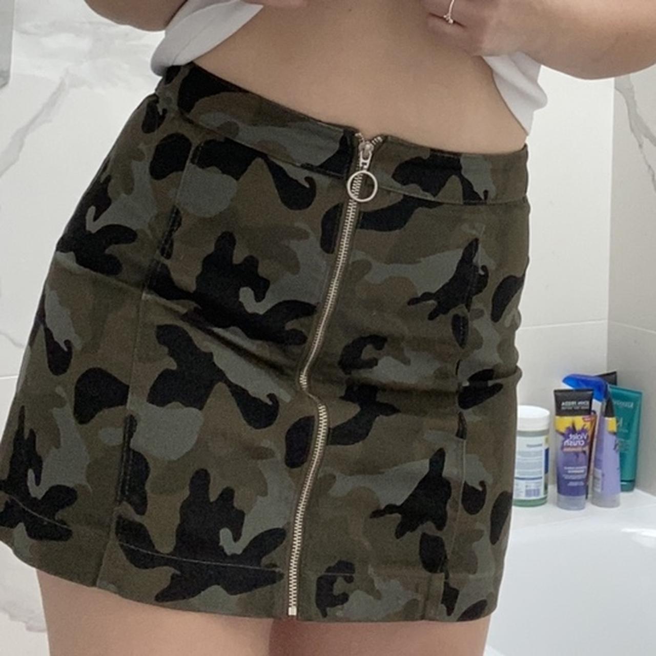 H M camo style skirt with zip. Size 14 and really. Depop