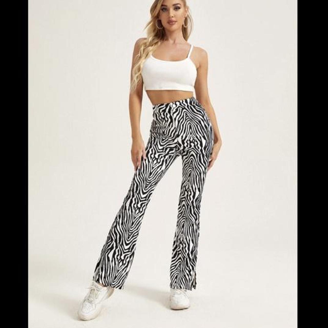 Shein zebra print flare leg trousers with button... Depop