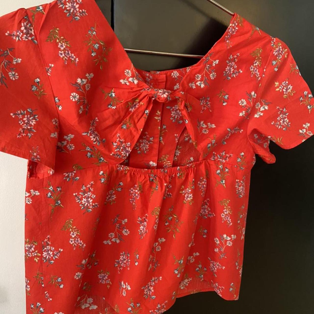 Red floral Zara top, knot design and open back with... Depop