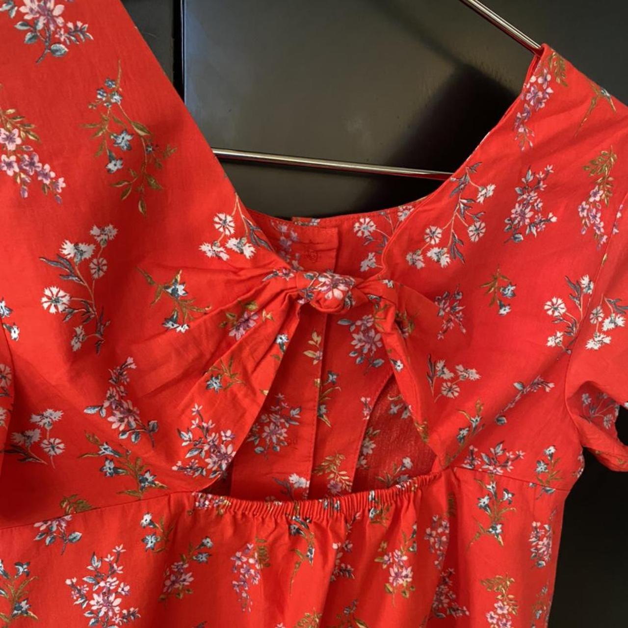 Red floral Zara top, knot design and open back with... Depop