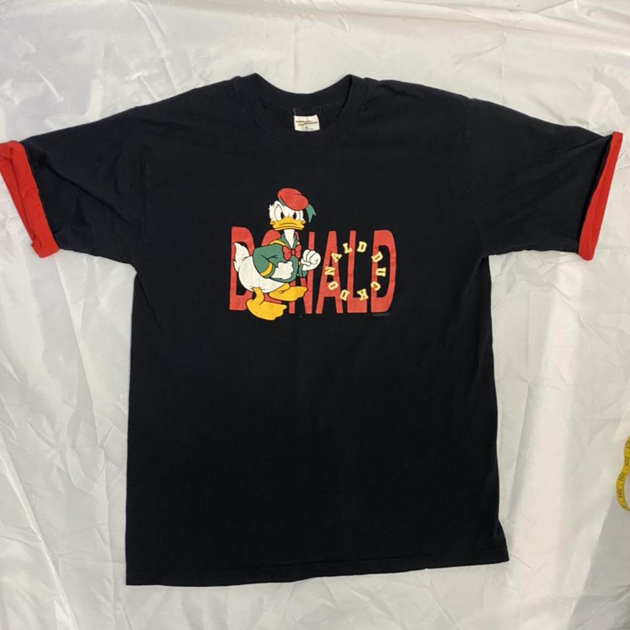 90’s Disney Donald Duck black T-shirt. Inner red... - Depop