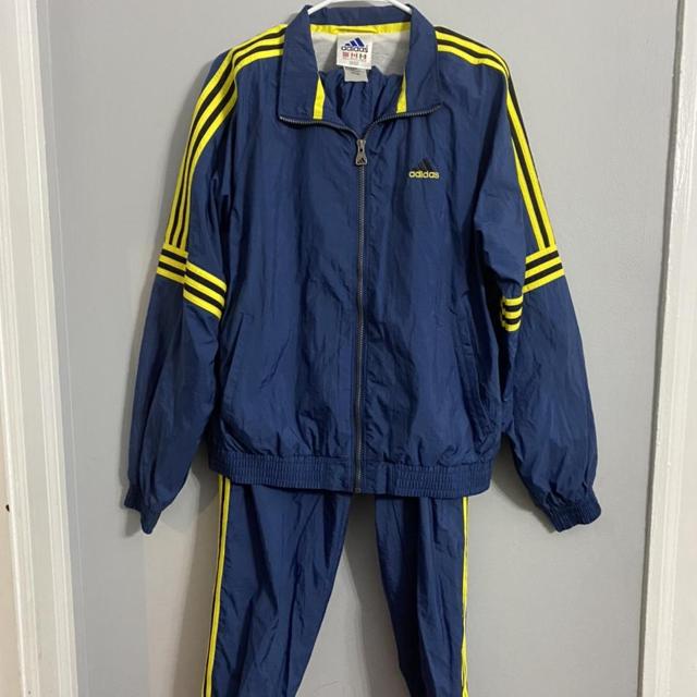 blue adidas tracksuit with yellow stripes