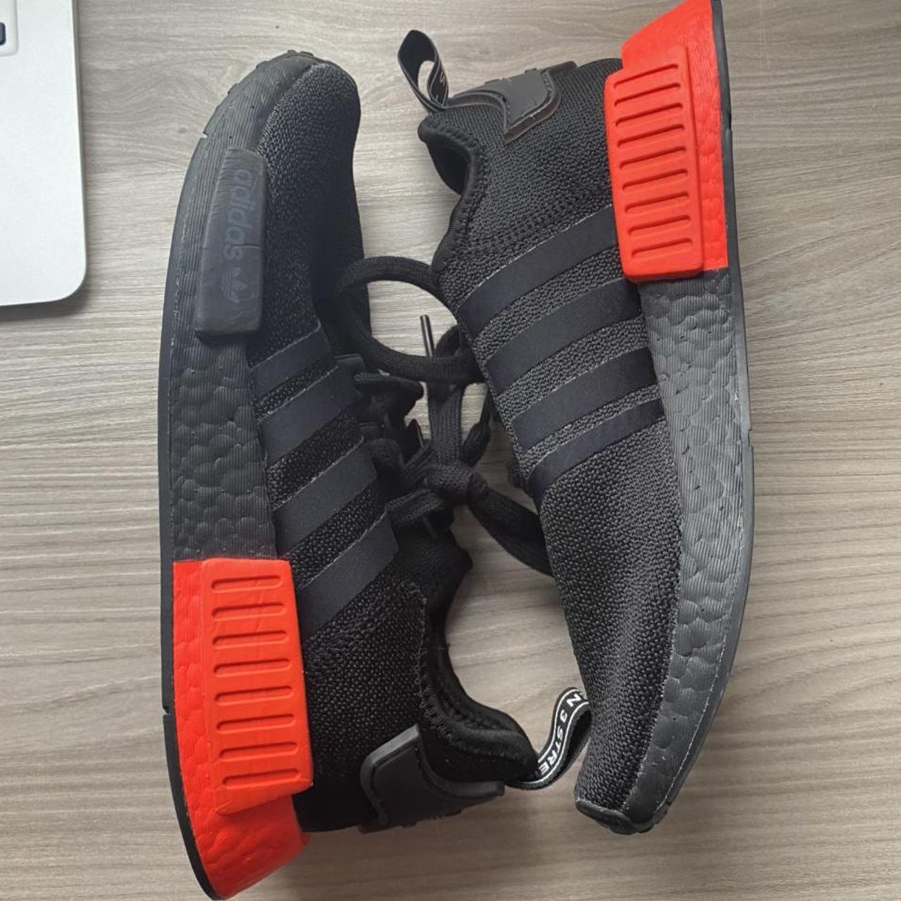 Nmd r1 black red clearance sole