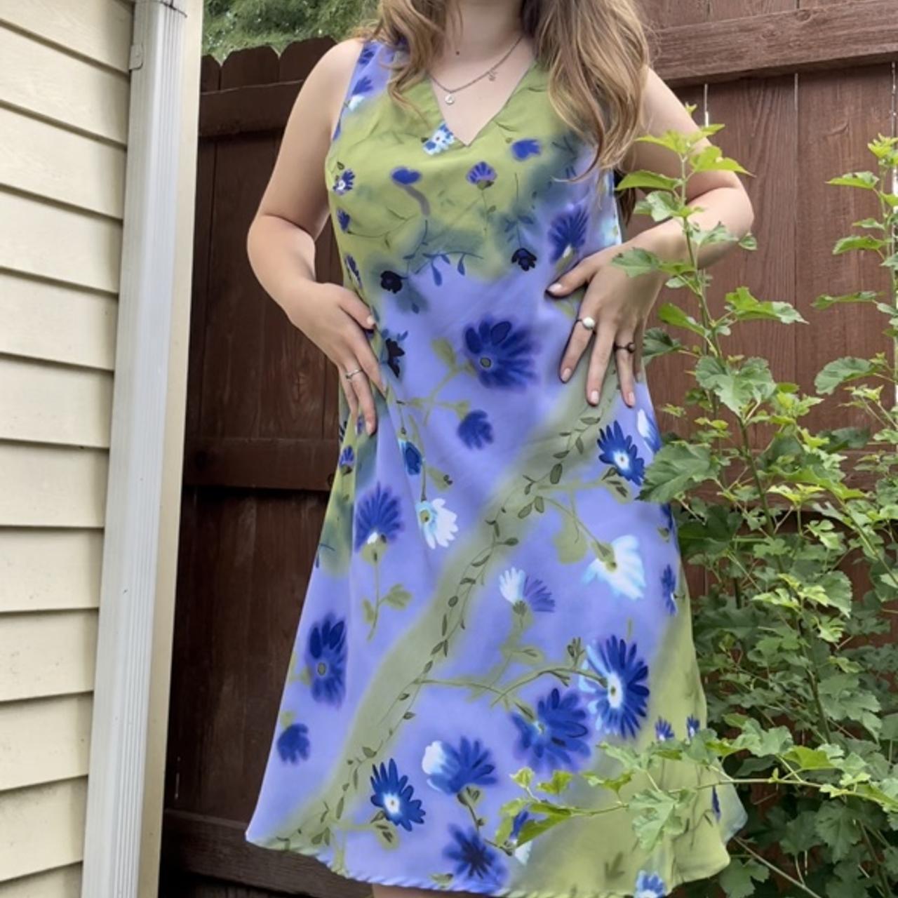 a floral Wild Thymé dress. it’s so cute, gives me... Depop