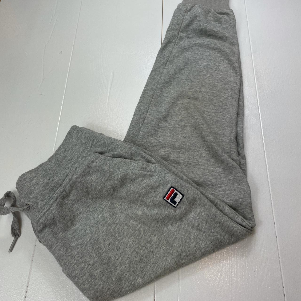 FILA grey joggers/tracksuit bottoms with embroidered... - Depop