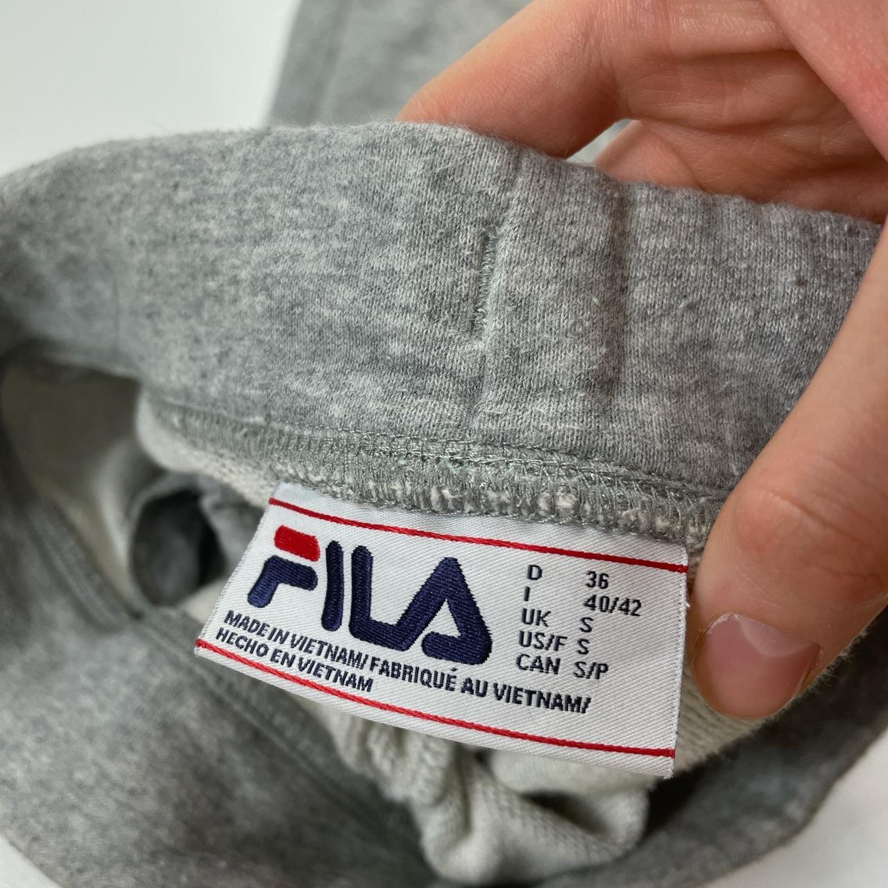 FILA grey joggers/tracksuit bottoms with embroidered... - Depop